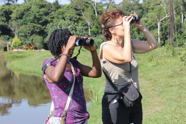 Muzungu with young birder Hope at Kasenge, Uganda. PHOTO Titus Kakembo