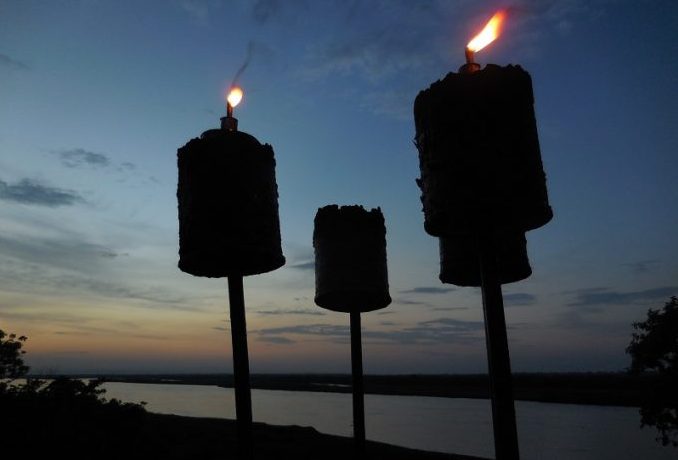 sunset over the river. Nile Safari Lodge, Murchison Falls, Uganda lamps