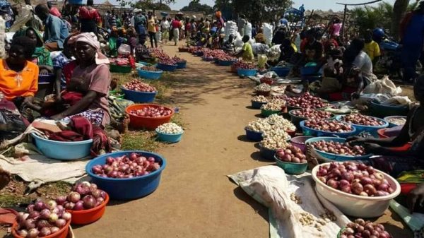 https://Border market in Vurra, West Nile, Uganda. Kampala and Kinshasa markets - with the border down the middle!