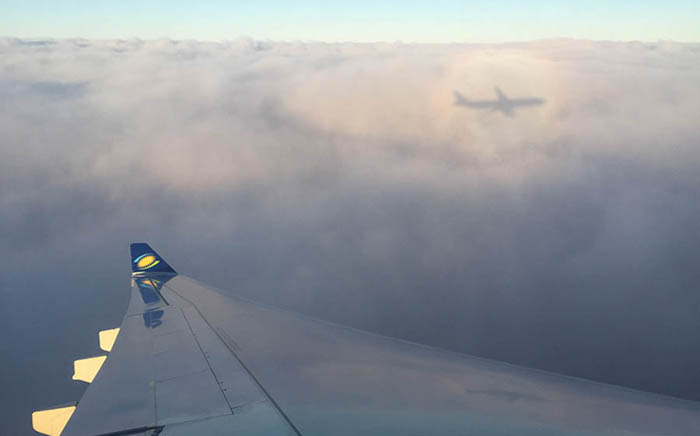 RwandAir flight aerial view wing. Diary of a Muzungu blog