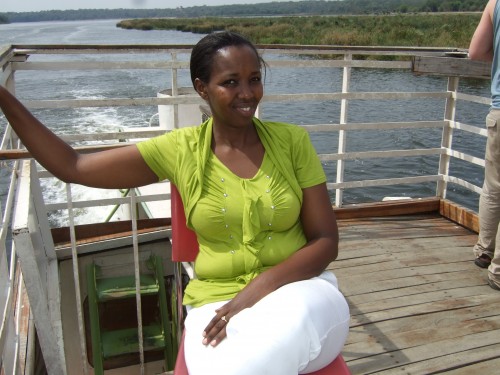 Meronie on boat trip enjoying Uganda's natural beauty