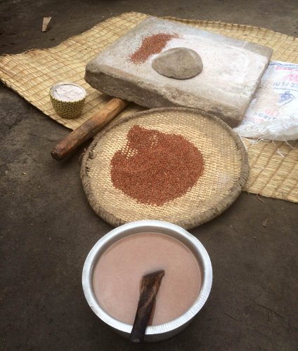 Preparing millet. Agartha's Taste of Uganda Tour. Ishasha